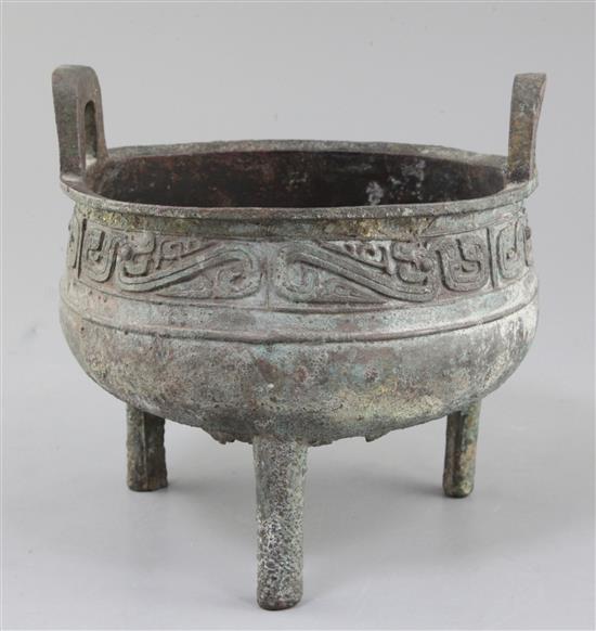 A large Chinese archaic bronze ritual food vessel, Ding, Western Zhou dynasty, 10th century B.C., 19cm high, 20cm wide